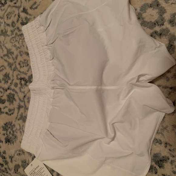 lululemon athletica Pants - Lululemon Hotty Hot shorts in white. Size 8.